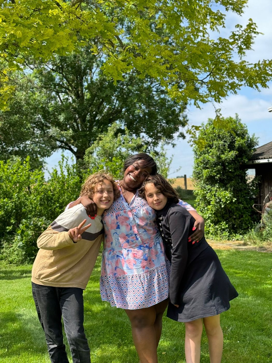 Magnolia hugging the kids in the garden